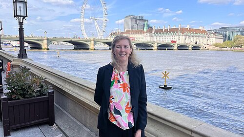Ellen Nicholson with Houses of Parliament in the background