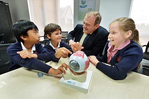 Ed Davey with three school chilcren